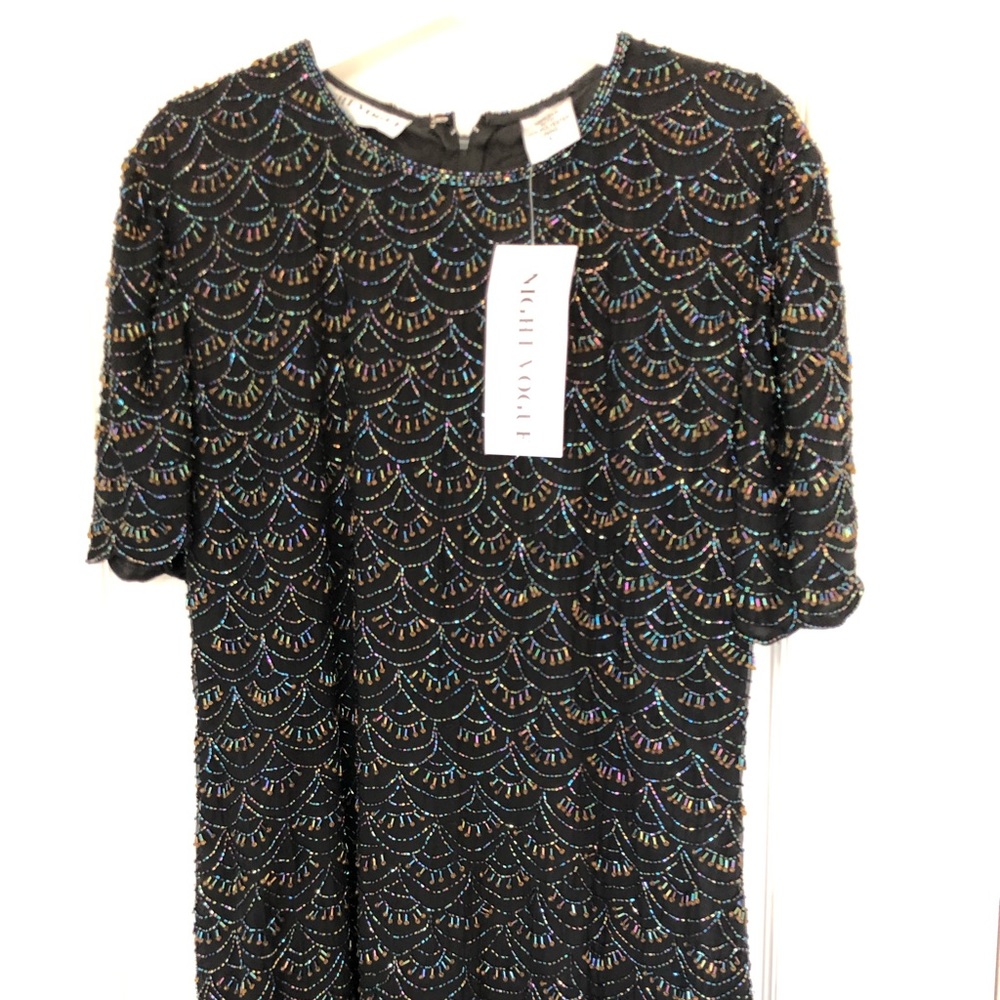 Night Vogue dress, Size L (8-10). 100% silk with 100% polyester lining.